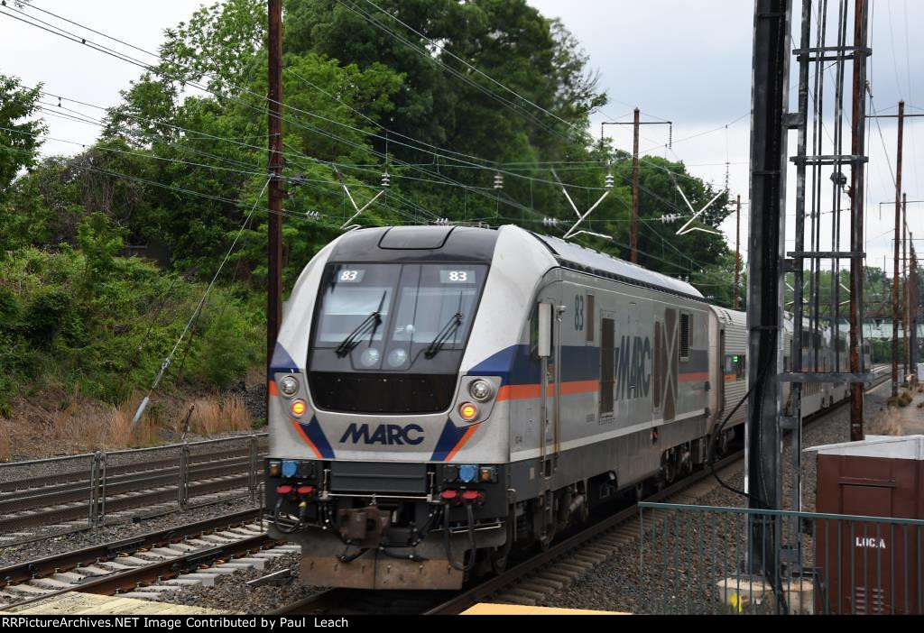 Commuter shoves out of the station